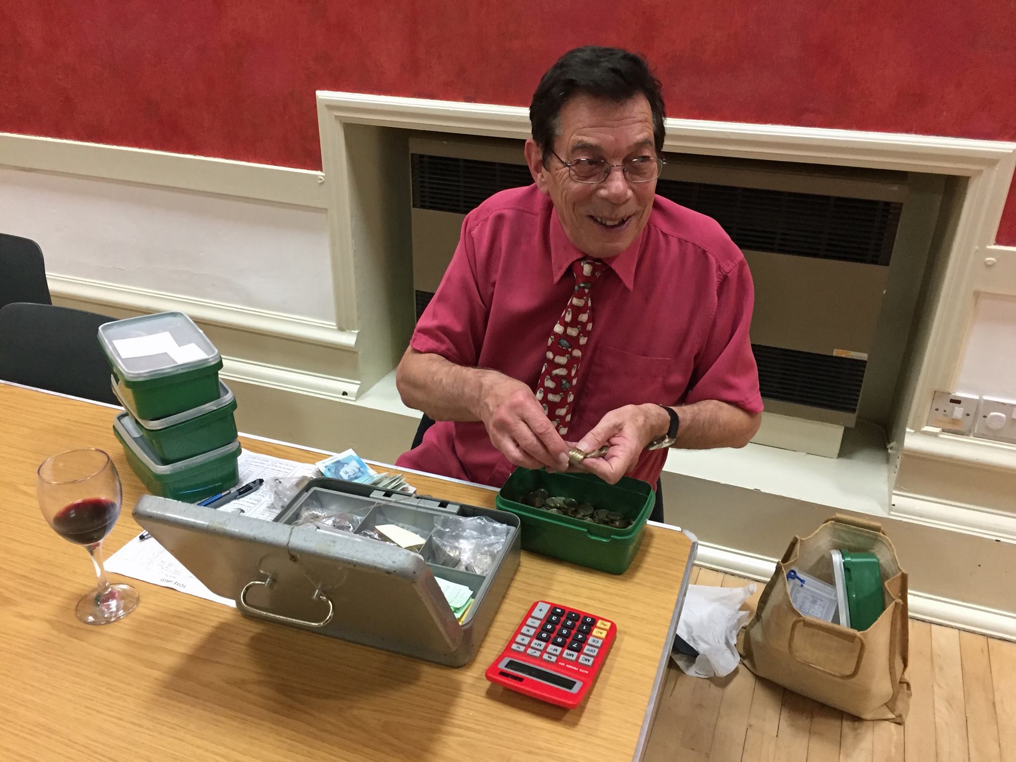 Rotary Treasurer Bob Stephenson Counting the Proceeds
