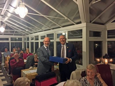 David Black Receiving a Presentation From President Nigel Collins