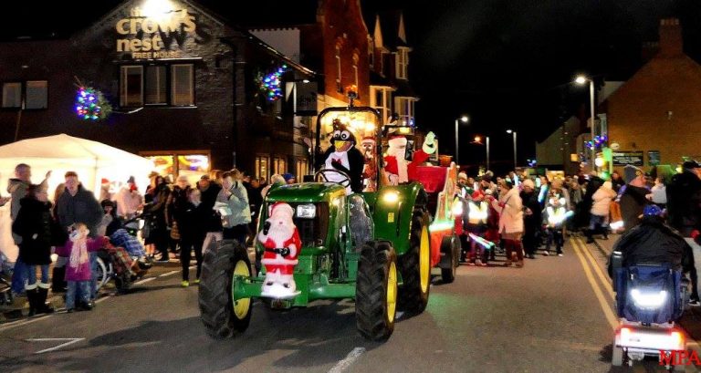 Santa leading the procession to his grotto