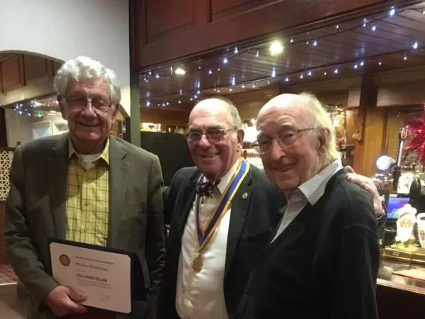 Rev'd Stephen Holdaway (left) and Dr David Ferguson (right) Receive Paul Harris Awards from President John Clarke
