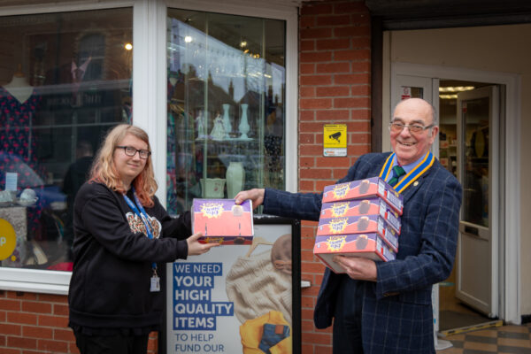 President John Clarke with Sales Assistant Rebecca Evans