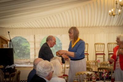 Judi Rastall Presents John Clarke with the President Nominee Regalia
