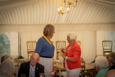 Kath Hayes Presents the President Elect Regalia to Judy Rastall