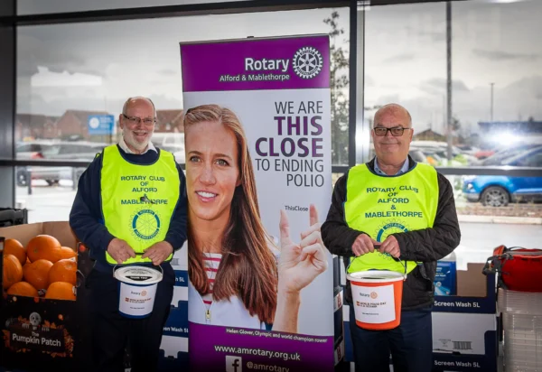 Rotarians Nigel Collins and Colin Harpham collecting for World Polio Day